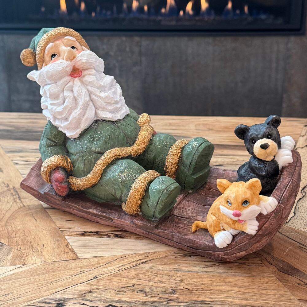 Vintage Resin Santa on Log Sled Figurine 12” Faux Carved Wood Father Christmas